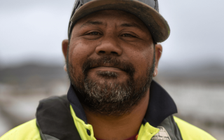 Male deckhand looking at camera